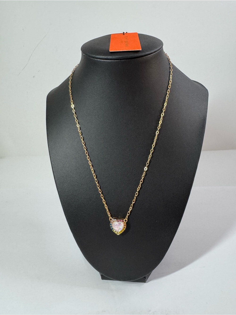Kurt Geiger Gold Heart Necklace and earrings with Pink Center Stone